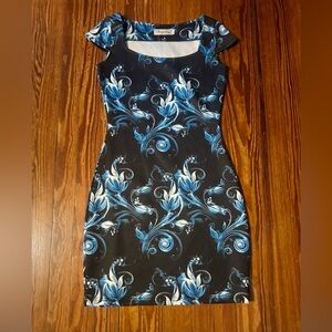 Fitted Pencil Dress with a black background and a blue and white floral